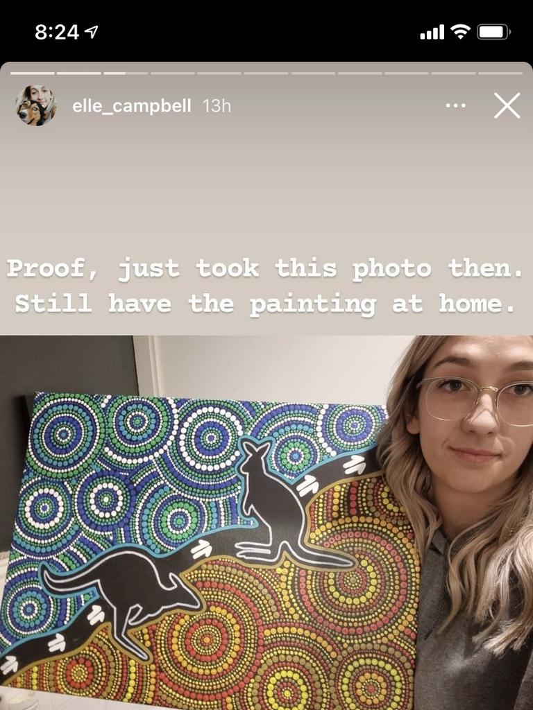 Elle Campbell with the painting she claims is the source of Port’s guernsey design.