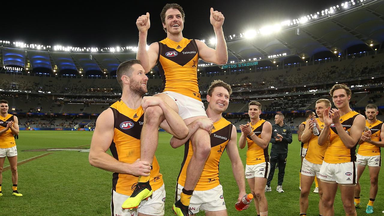 Isaac Smith being chaired off after his 200th game - and potentially his last for Hawthorn. (Photo by Paul Kane/Getty Images)