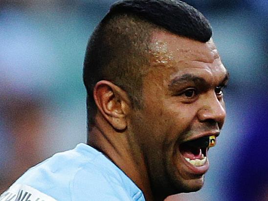 Waratahs Kurtley Beale celebrates after scoring a try during the Waratahs v Lions Super Rugby match at Allianz Stadium, Sydney. Pic Brett Costello