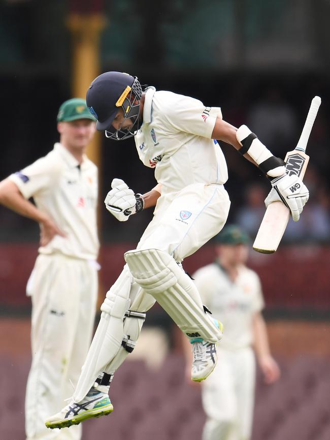 Sangha celebrates his Shield century. Picture: AAP