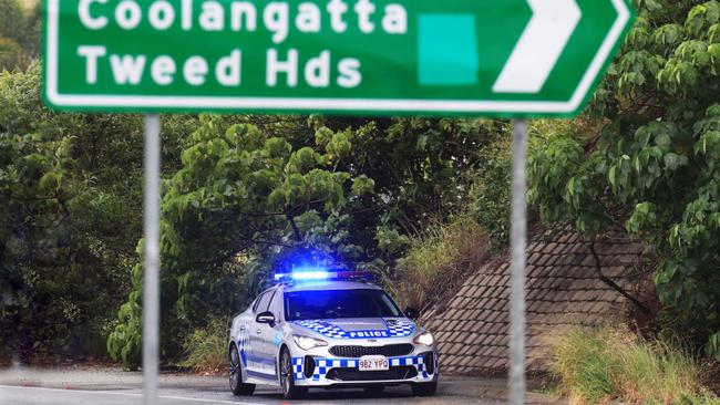 A Queensland Police car sits on the border of NSW and Queensland on the M1 Highway at Bilinga. Picture: Scott Powick Australia