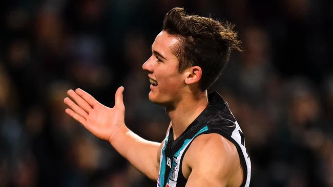 Connor Rozee of the Power celebrates after kicking a goal during the round 14 match against the Cats. Picture: Getty Images