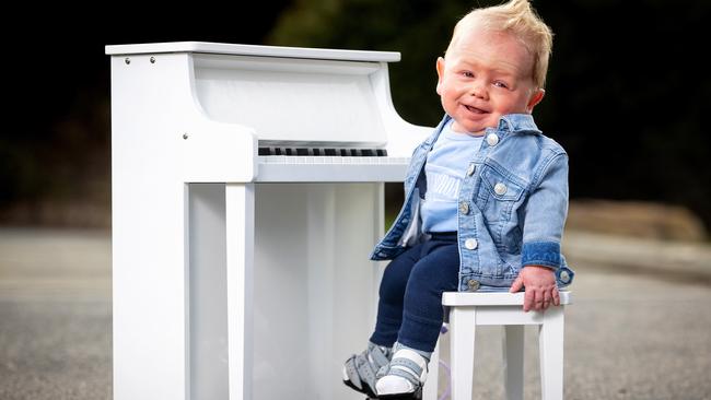 Leo Cussen, 16 months, has Netherton Syndrome, bilateral talipes and silent aspiration. Leo loves music and playing the piano. Picture: Mark Stewart