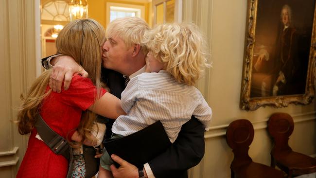 Boris Johnson hugs wife Carrie and their children after delivering his resignation statement in Downing Street. Picture Andrew Parsons / No 10 Downing Street