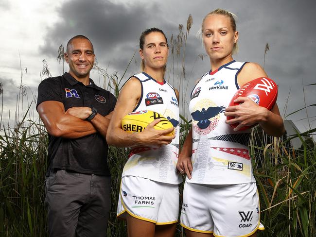 Crows AFLW co-captains Chelsea Randall and Erin Phillips wearing their indigenous jumper which was designed by former Crows champion Andrew McLeod. Picture: Sarah Reed.