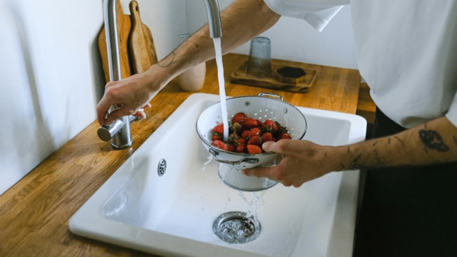 Unfortunately rinsing the produce isn’t sufficient on its own. Image: Pexels.