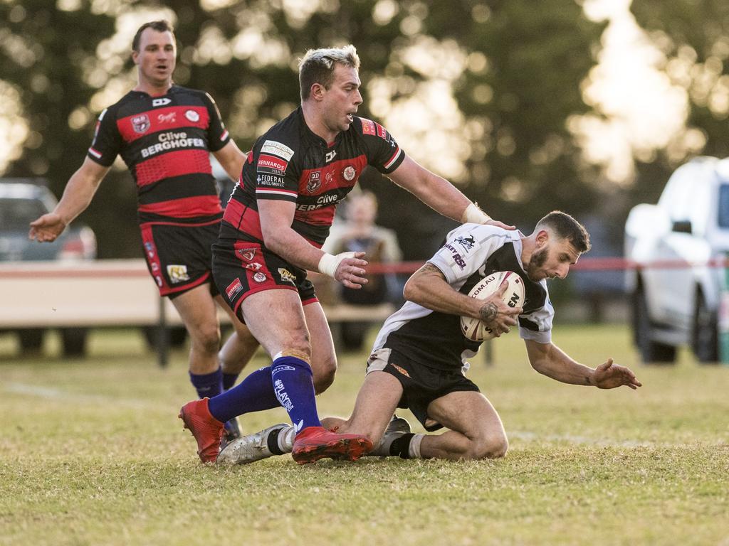 Angus Taylor (centre) of Valleys and Dylan Adamson of Oakey in TRL A grade round 10 rugby league at Herb Steinohrt Oval, Sunday, June 20, 2021. Picture: Kevin Farmer