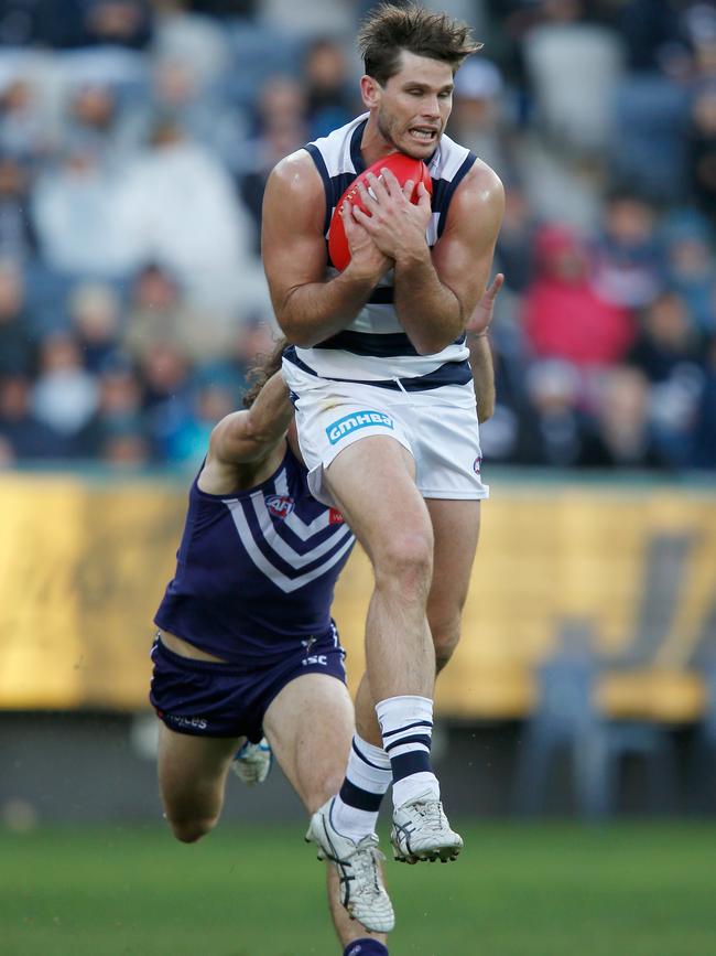 Geelong’s Tom Hawkins marks the ball  at Kardinia Park. Picture: Darrian Traynor/Getty