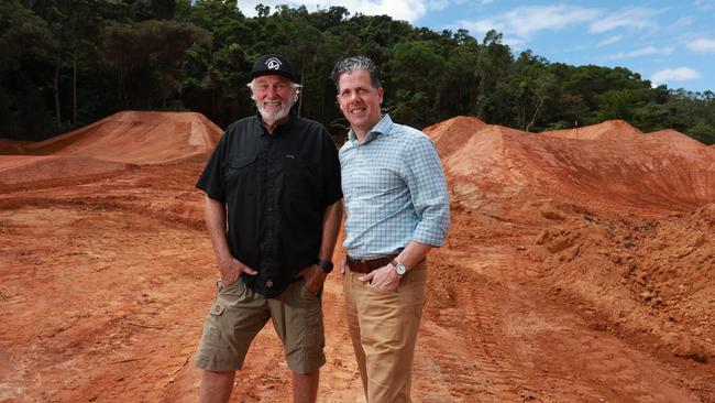 World Trail director Glen Jacobs and Tourism Tropical North Queensland CEO Mark Olsen among mega jumps at the Smithfield Mountain Bike Park. Picture: Brendan Radke