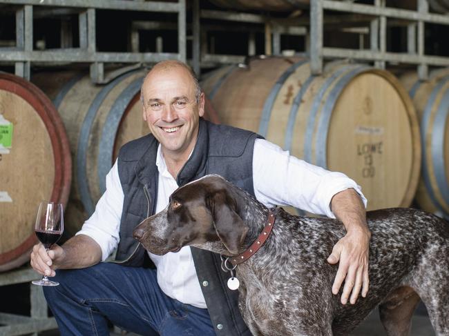 Winemaker David Lowe inspecting wine during the production process at Lowe Wines winery in Mudgee.