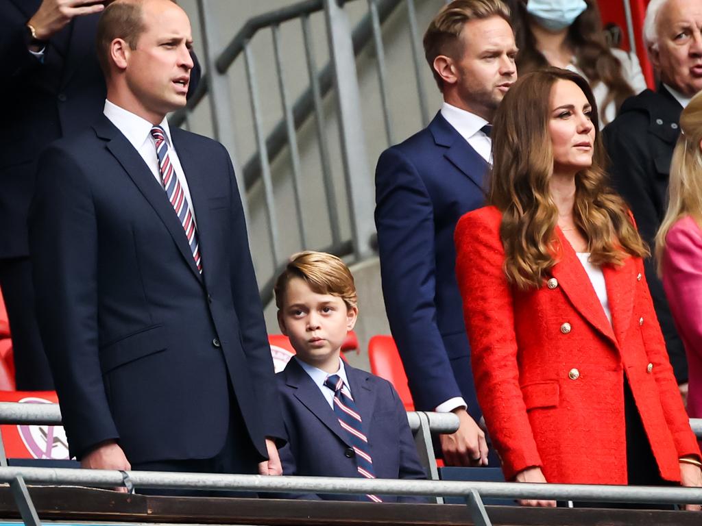 Prince William in the stands with his wife Kate and Prince George. Photo: Christian Charisius Getty