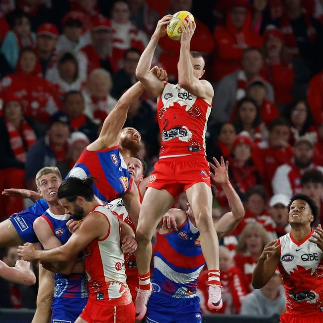 Warner took a towering mark on top of teammate, Swans ruckman Brodie Grundy, before kicking his third goal during the win over the Western Bulldogs on Thursday night. Picture: Michael Willson / Getty Images