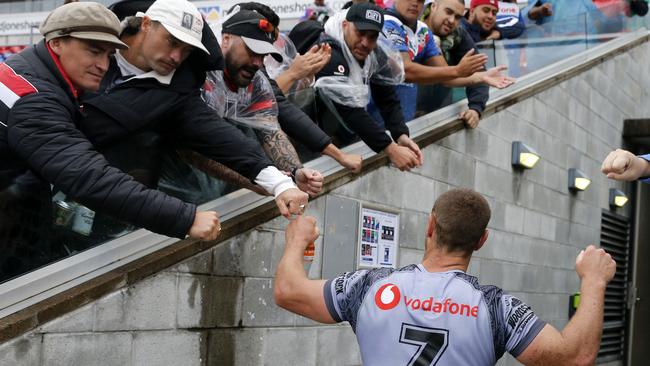 Blake Green of the Warriors knocks fists with fans in Newcastle. Picture: Darren Pateman