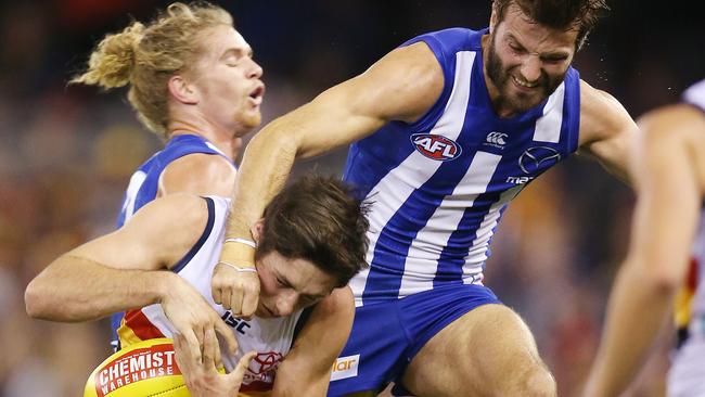 Adelaide's Chayce Jones cops a heavy knock in the first term against North Melbourne. Picture: Michael Klein