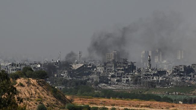 Smoke rises from inside Northern Gaza.