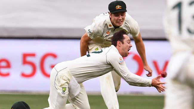 Australia's Travis Head drops a catch from Indian captain Ajinkya Rahane as teammate Cameron Green looks at the MCG