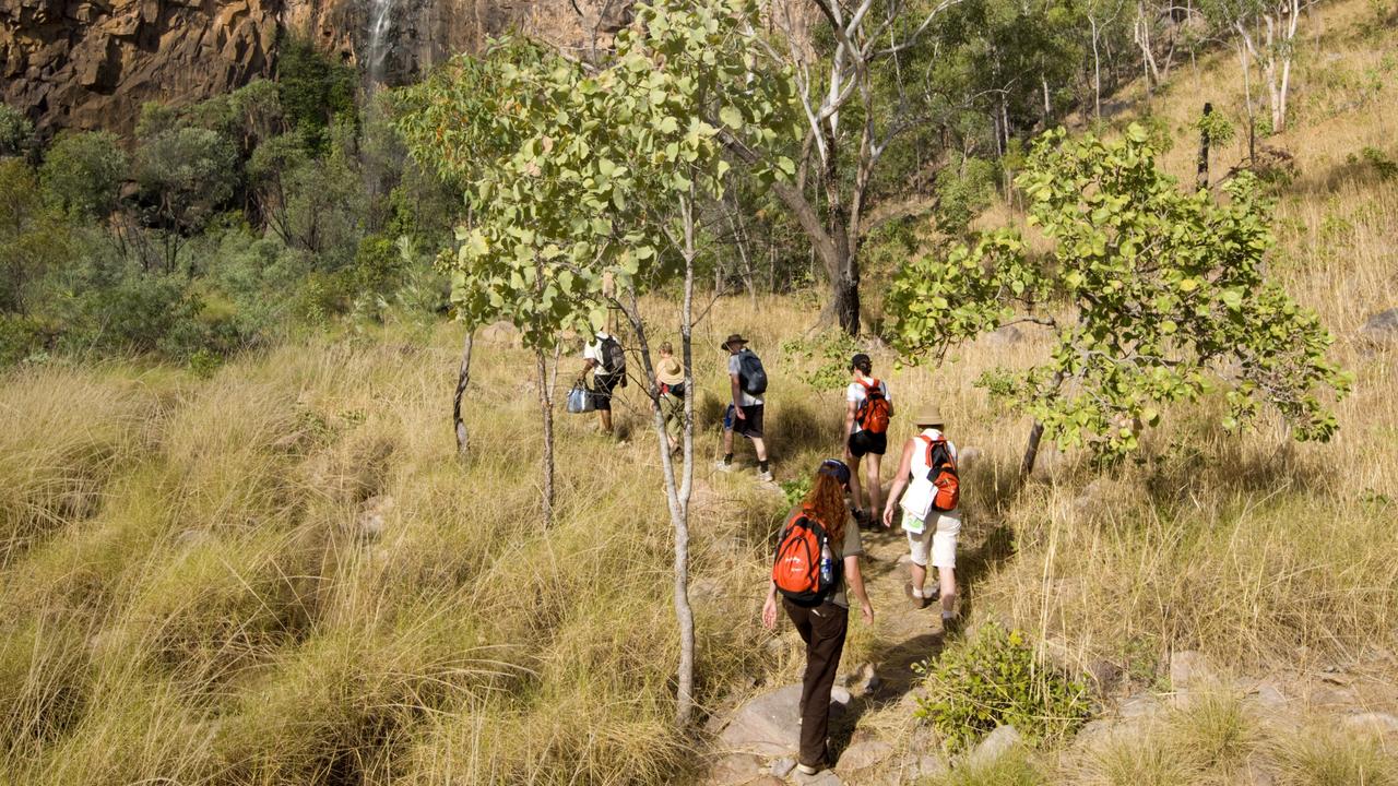 Visitors walking into Northern Rockhole along the Jatbula Trail. Picture: Tourism NT/Peter Eve