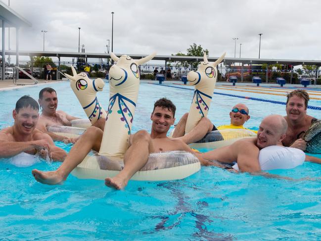 PHOTOS: Mackay fireys slip into togs for 60km Movember swim
