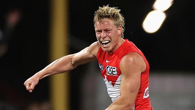 SYDNEY, AUSTRALIA - SEPTEMBER 07: Isaac Heeney of the Swans celebrates kicking a goal with Jake Lloyd of the Swans during the AFL First Qualifying Final match between Sydney Swans and Greater Western Sydney Giants at Sydney Cricket Ground, on September 07, 2024, in Sydney, Australia. (Photo by Cameron Spencer/Getty Images)