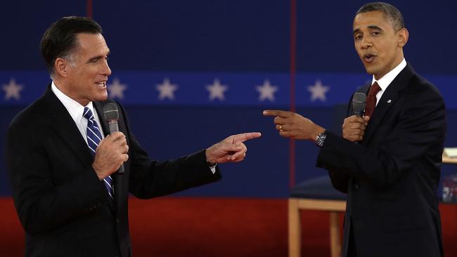 Barack Obama’s team blasted Mitt Romney well before he won the nomination. Here the candidates spar during the second debate in October 2012.