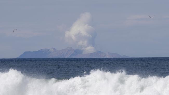 Plumes of steam rise above White Island. Picture: AP