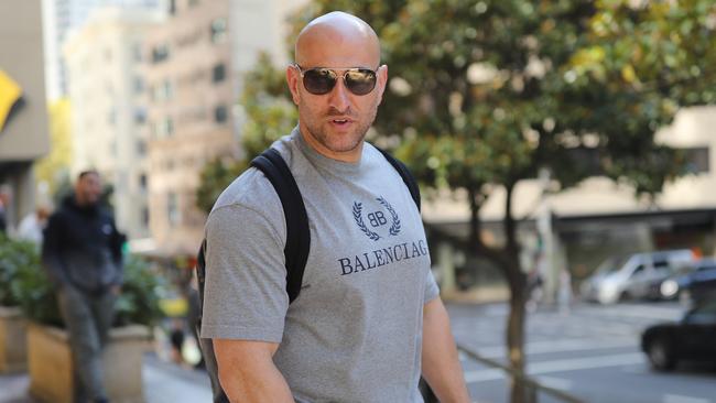 Designer-loving bikie Tarek Zahed leaves the Downing Centre in 2021. Picture: Christian Gilles