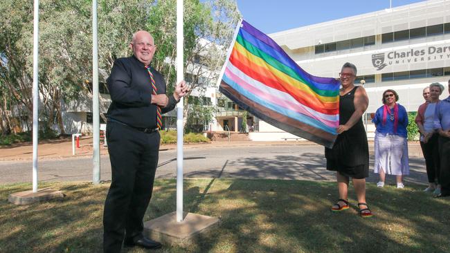 Charles Darwin University is launching a new CDU Ally network where staff advocates will undergo training to better understand LGBTIQIA+ inclusion. CDU Vice-Chancellor Scott Bowman AO raises the Rainbow Flag. Picture Glenn Campbell