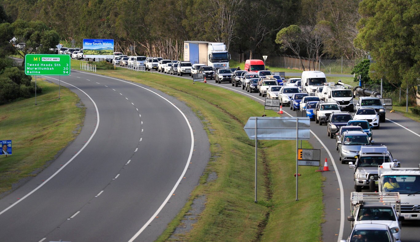 Traffic is backed up Kilometres on the Gold Coast Highway and M1 due to Queensland Police setting up a road blocks due to the Corona Virus at the NSW / Queensland Border on the old Pacific Highway at Coolangatta. Photo: Scott Powick Newscorp