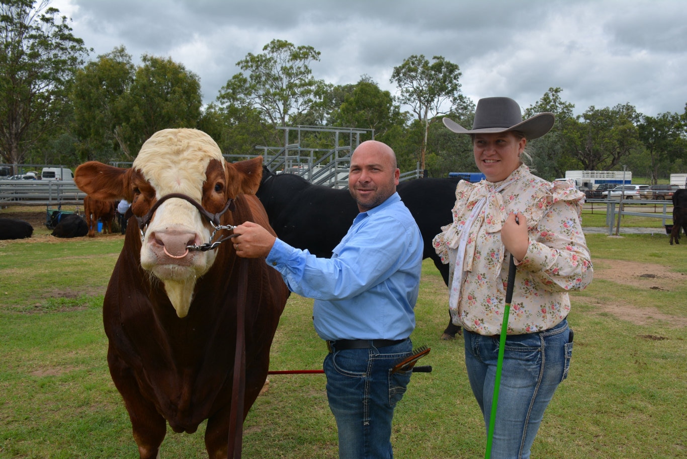 Marty Rowlands from KBV Simmental Stud at Djuan with and Tegan Lavender at the 71st annual Cooyar Show. Picture: Kate McCormack