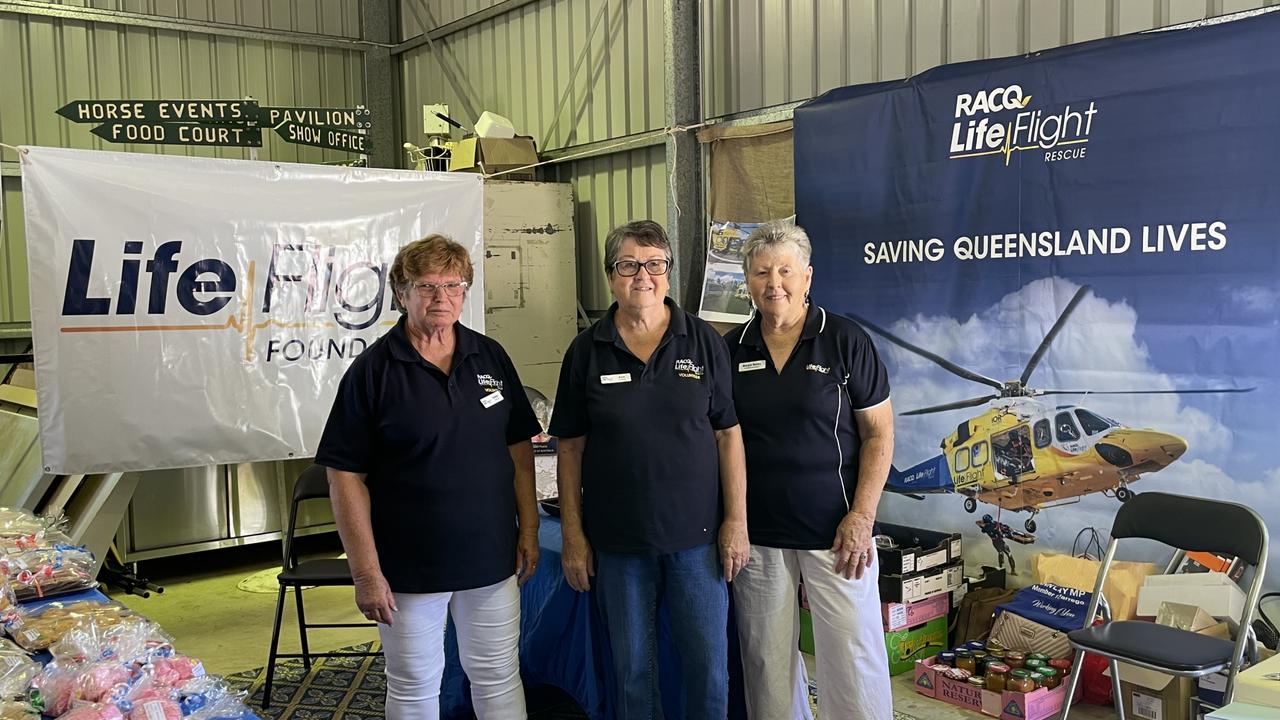 Margie Bailey, Ann Kussrow and Helen Morgan at the RACQ LifeFlight stall Picture: Emily Devon