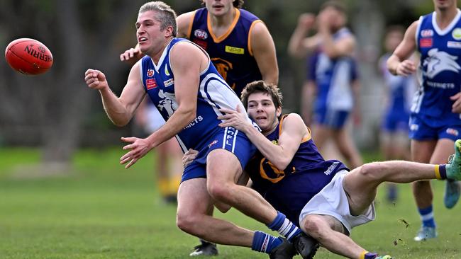 EDFL: Coburg Districts’ James Scheriani is tackled by Brad Cohen of Jacana. Picture: Andy Brownbill