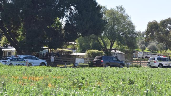 Police at the scene of a “high-risk incident” at a Sandy Creek property. Picture: Jason Katsaras