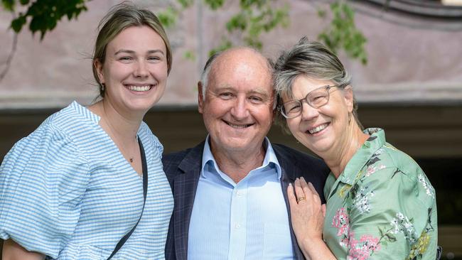 Former Renewal SA boss John Hanlon, centre, with his daughter Milli and wife Jenny after the case was dropped. Picture: NCA NewsWire / Brenton Edwards