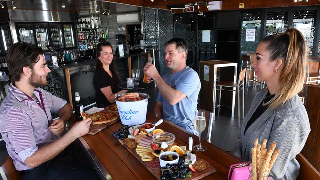 Alan Haber, Manager Tania Mackie, David Egan and Megan Gray at MOJO Rooftop Bar at the Ambassador Hotel. Picture: Tony Martin