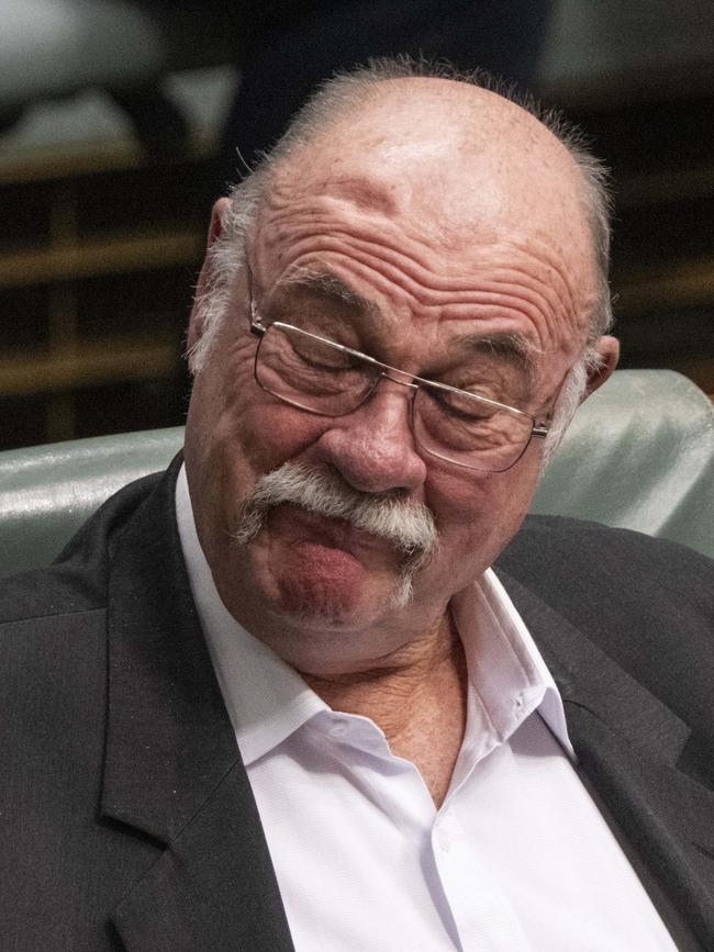 LNP MP Warren Entsch listens to Health Minister Mark Butler during Question Time in federal parliament on Monday. Picture: NCA NewsWire / Martin Ollman