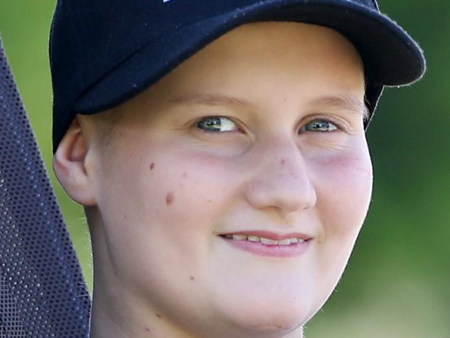 Abbi Head 13 ,poses for a photo at Bellmere 3rd April 2018Abbi Head 13 , of Bellmere who has EwingÕs sarcoma will be presenting Prince Charles and Duchess Camilla with the Lady Cilento ChildrenÕs Hospital teddy bear for the royal visit to the hospital.Photo AAP/ Ric Frearson