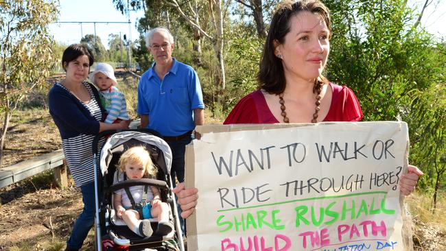 Zoe Metherell with baby Fraser, Madeline Farrugia with baby Alfie, and Bruce McGregor want a pathway in Rushall Reserve to make it more accessible. Picture: Dennis Manktelow