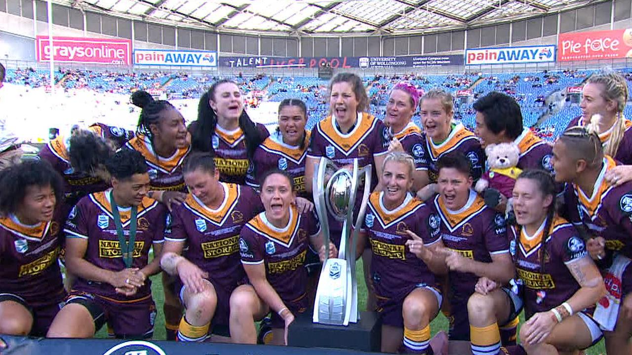 Broncos celebrate their NRLW title win.