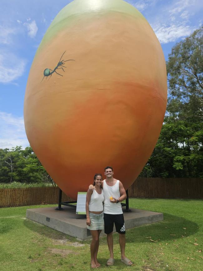 Mary Fowler and Nathan Cleary stopped at the Big Mango on December 30 during their road trip to Cairns.