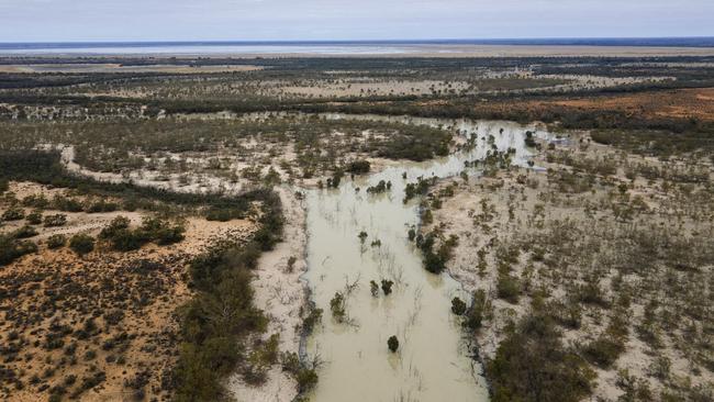 Water flows between Lake Menindee and Lake Cawndilla in western NSW. Picture: Getty Images