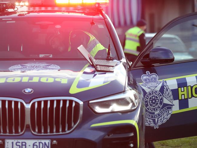 Police inspecting cars for defects at Waurn Ponds Police Station on Saturday morning. Picture: Alan Barber