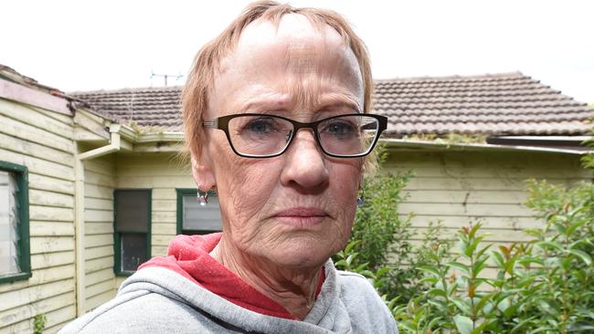 Joanne Leszko says drug users who frequent the abandoned property next to her house have left her ‘vulnerable and shaky’. Picture: Lawrence Pinder