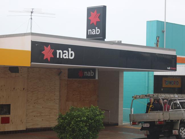 Bowen’s NAB took cyclone preparation to ultimate levels by boarding up their entire Herbert Street Shopfront on Monday.