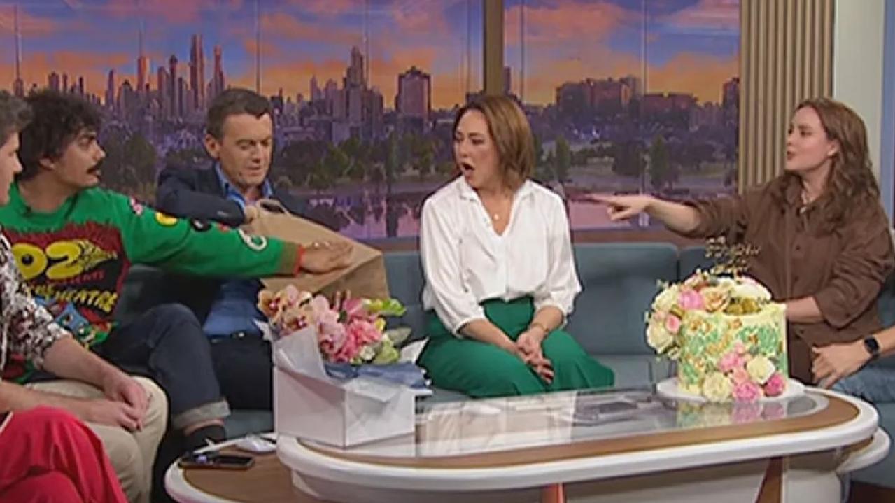 Last month, Tony Armstrong covered the Coles logo on a shopping bag on ABC New Breakfast citing “editorial standards”. Picture: ABC.