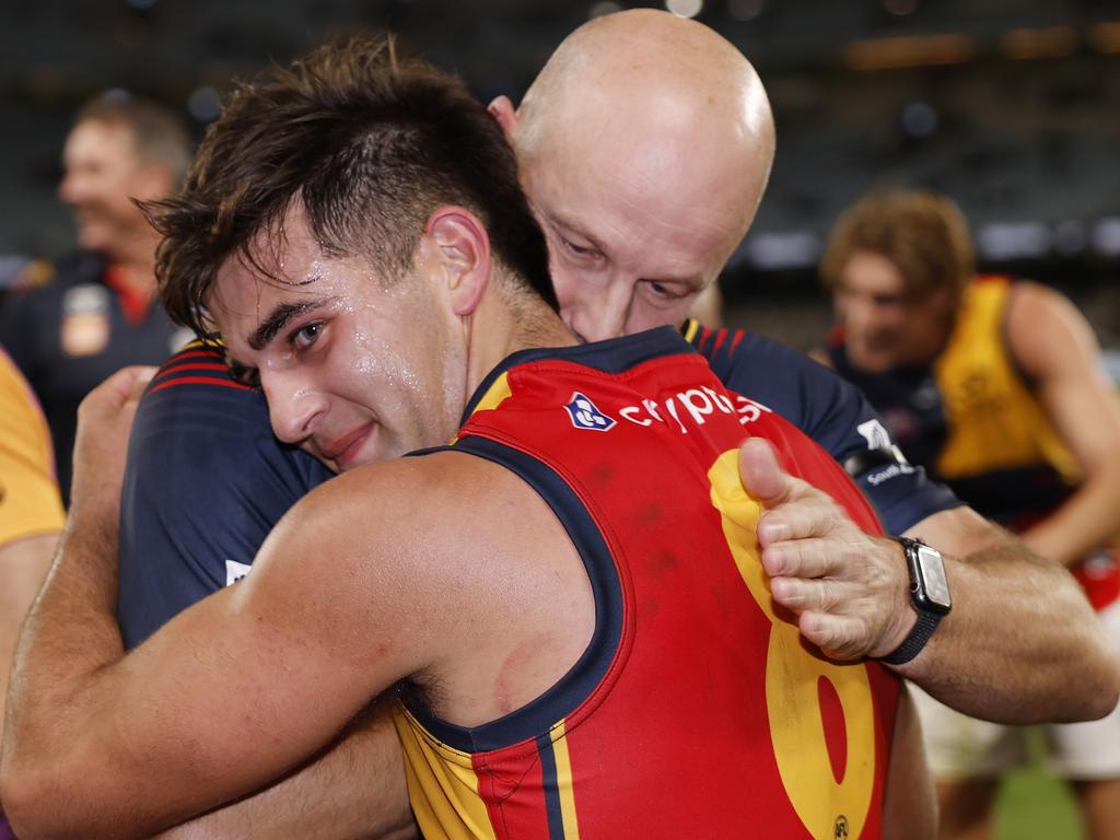 MELBOURNE, AUSTRALIA. April 13, 2024. AFL. Round 5. Carlton vs. Adelaide at Marvel Stadium. Josh Rachele hugs senior coach Matthew Nicks after tonightÃ&#149;s win over Carlton. Pic: Michael Klein