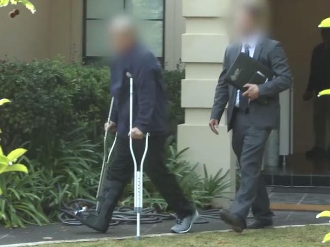 Police arresting Zhen Tao Qi at his Sydney home in September 2018. Picture: AFP