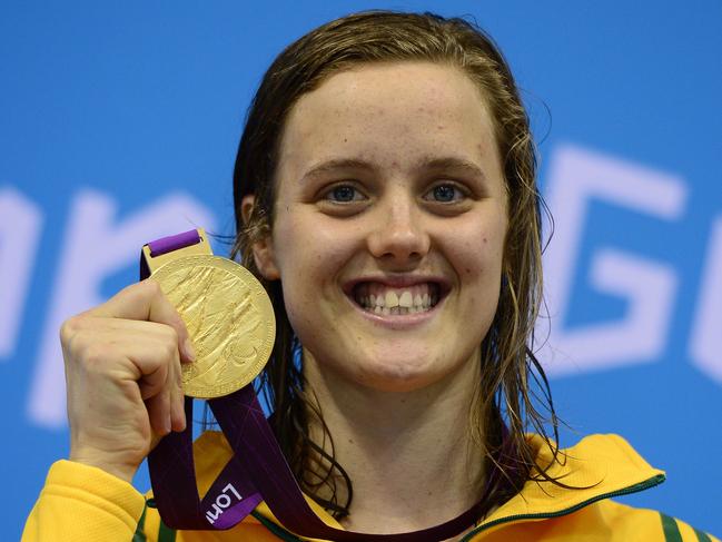 Cole with one of the four gold medals she won back in London in 2012. Picture: AFP Photo/Leon Neal