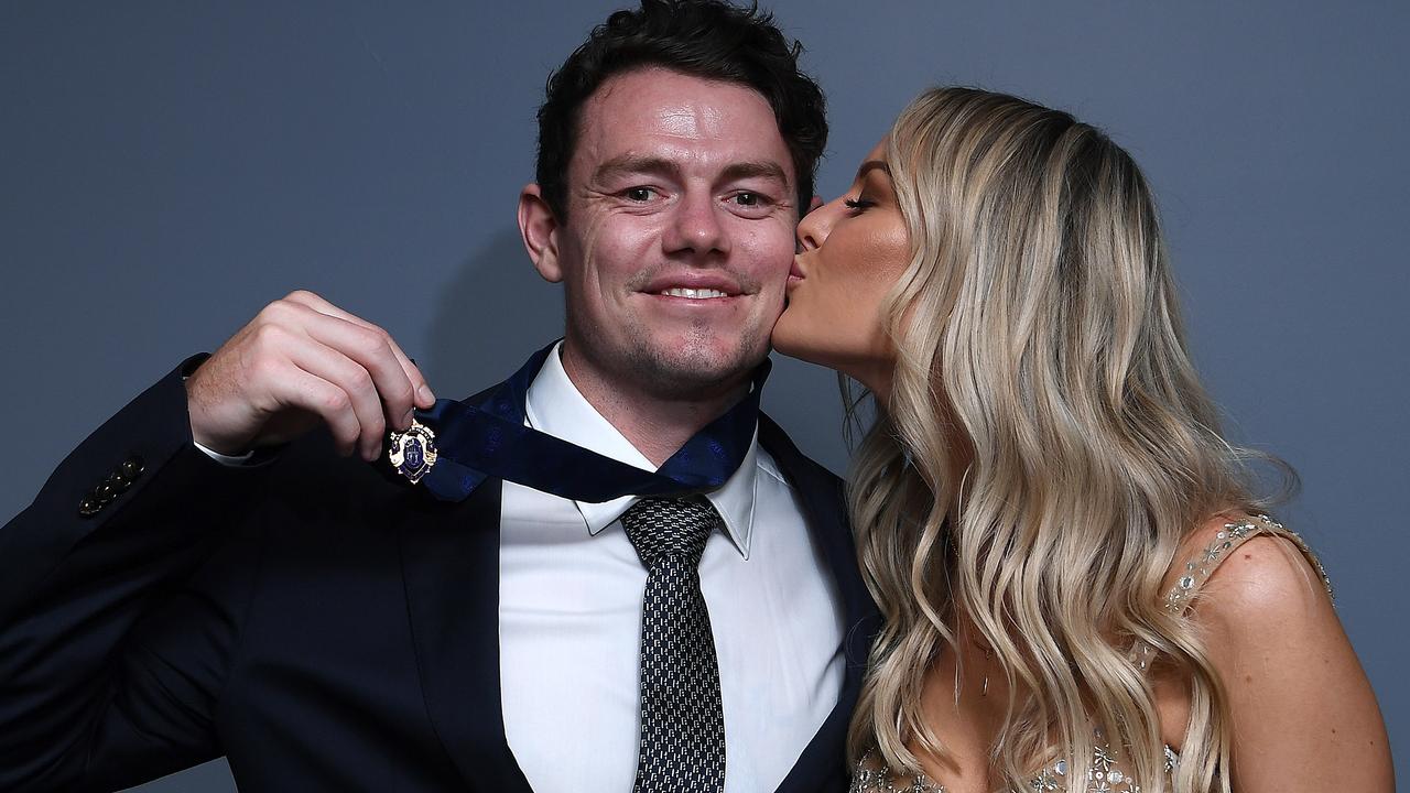 Lachie Neale with wife Julie Neale. Photo by Quinn Rooney/Getty Images.