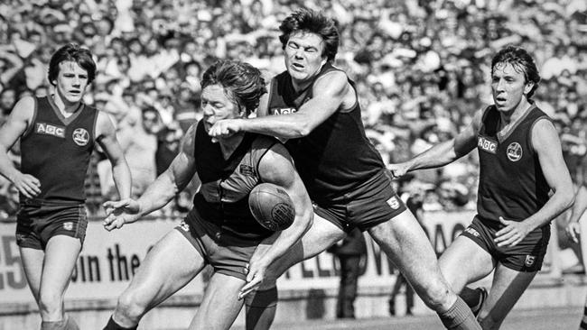 Neil Balme gives one to the chin. Picture: Bryan Charlton