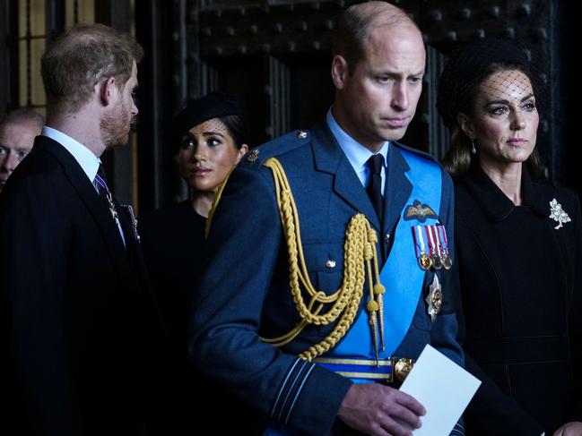 The four walked out of Westminster Hall after the service. Picture: AFP